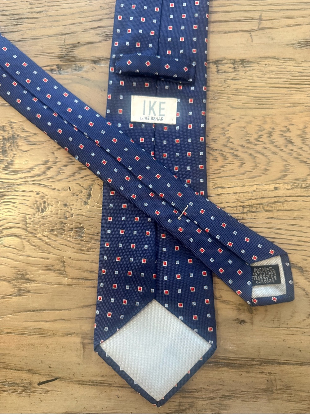 Ike Behar Navy Tie with Red and White Square Pattern